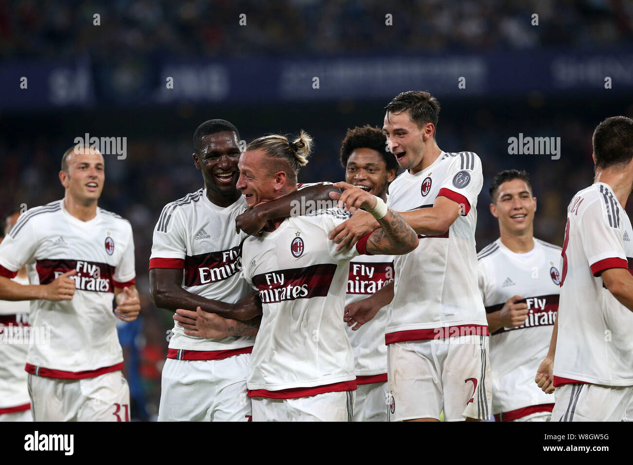 Philippe Mexes of AC Milan, center, celebrates with team members after  scoring a goal against Inter Milan in a soccer match during the 2015  Internatio Stock Photo - Alamy, image size:1300x956