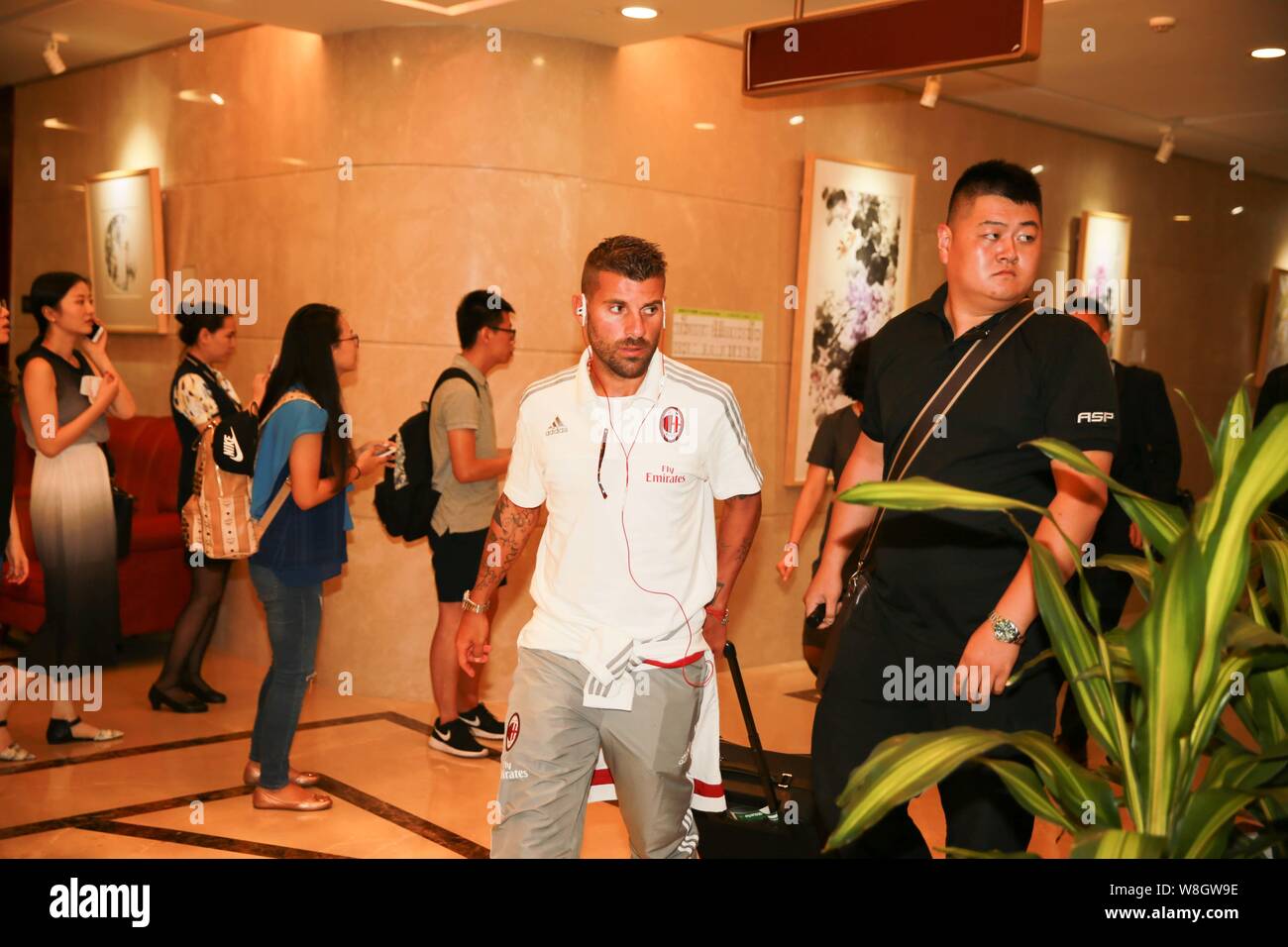 Antonio Nocerino of AC Milan arrives at the Shenzhen Baoan International Airport in Shenzhen city, south China's Guangdong province, 23 July 2015. Stock Photo
