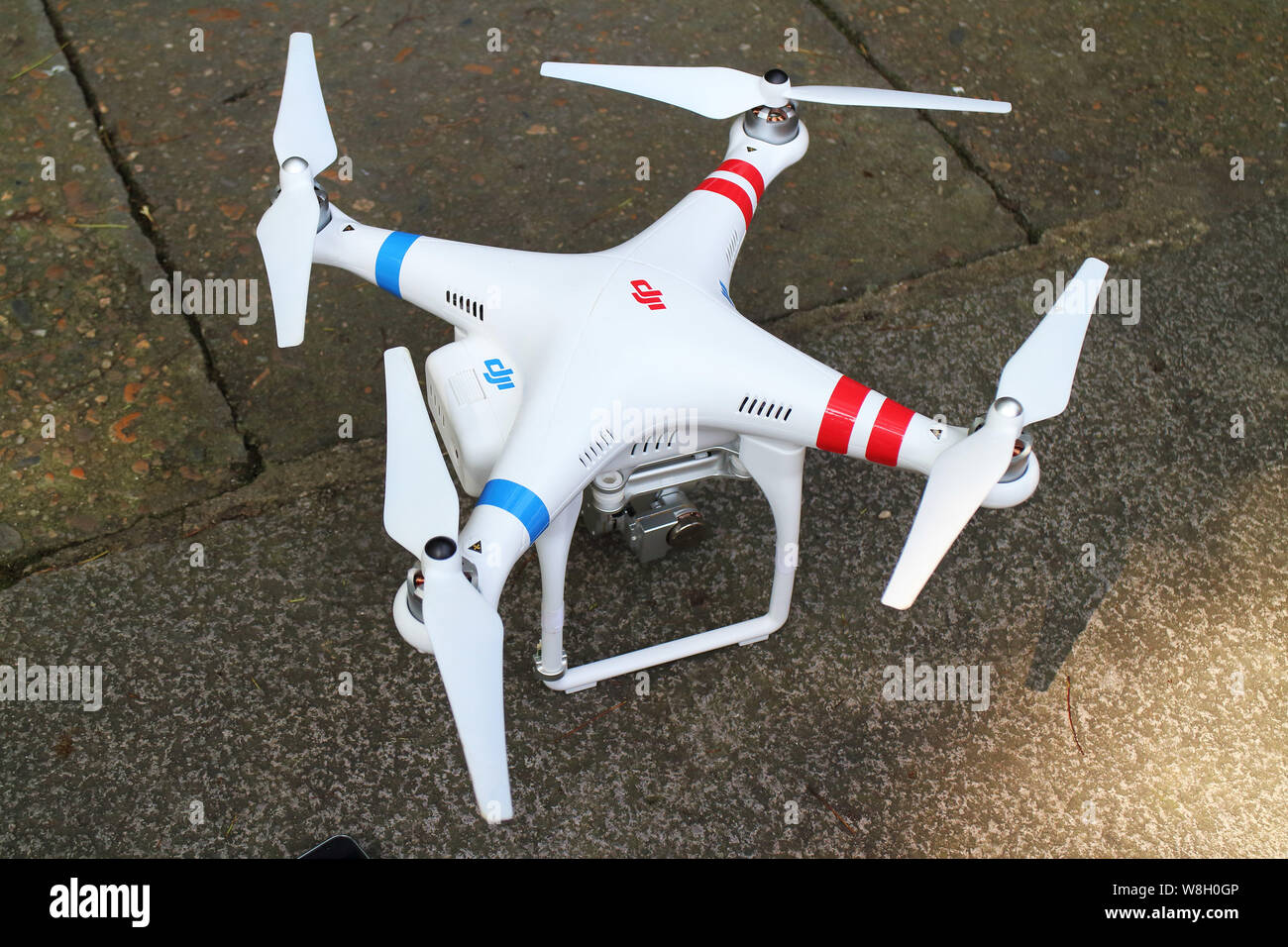 FILE--A Phantom 2 Vision+ unmanned aerial vehicle (UAV), or drone, of DJI ( Dajiang Innovations) hovers in Fuzhou city, southeast China's Fujian prov  Stock Photo - Alamy