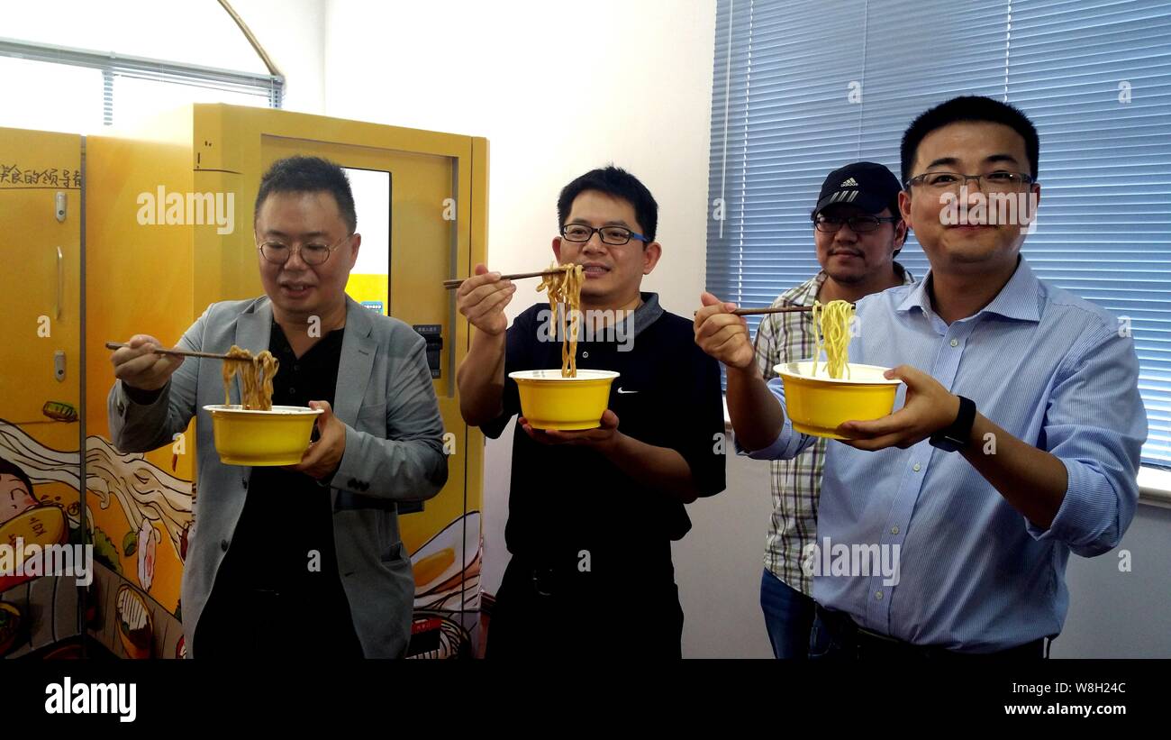 The investors of worlds first beef noodle vending machine show bowls
