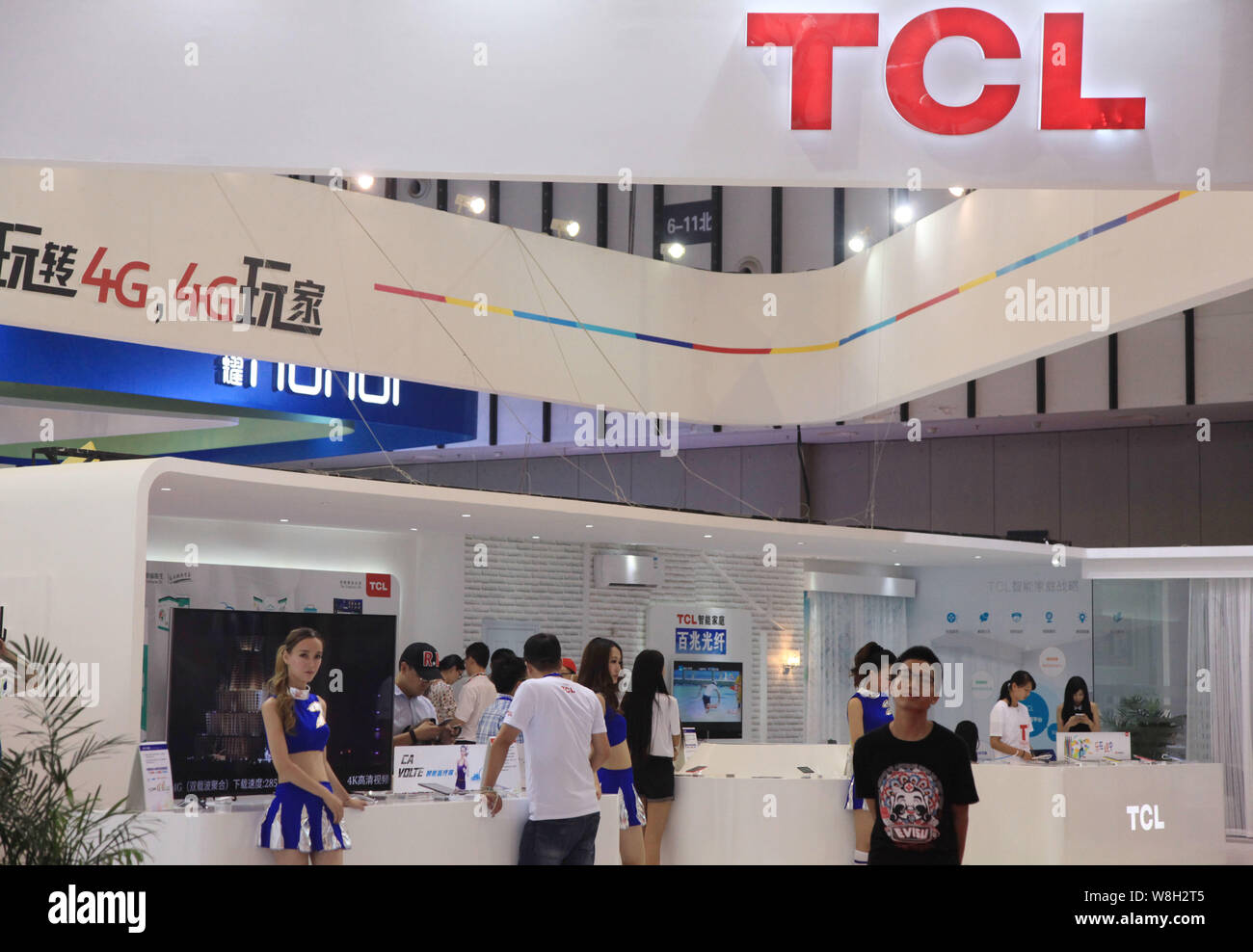 --FILE--People visit the stand of TCL during a fair in Nanjing city, east China's Jiangsu province, 4 July 2015.    TCL Corp, the leading Chinese home Stock Photo