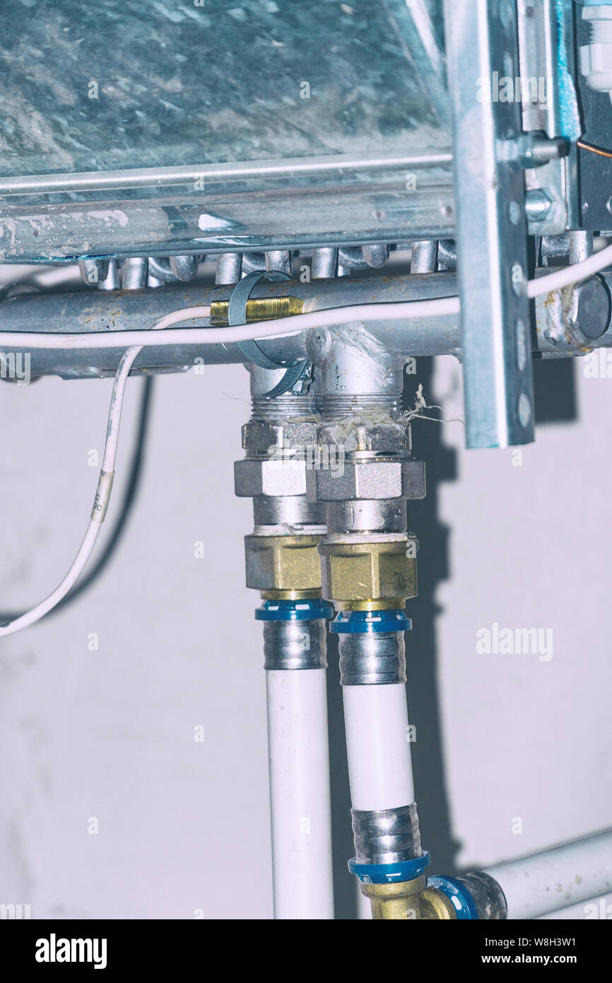 Elements of home heating system. Plumbing, plastic pipes, fittings