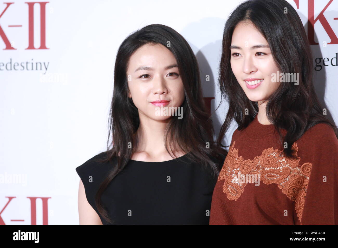 Chinese actress Tang Wei, left, and South Korean actress Lee Yeon-hee attend a promotional event for SK-II cosmetics in Seoul, South Korea, 3 Septembe Stock Photo