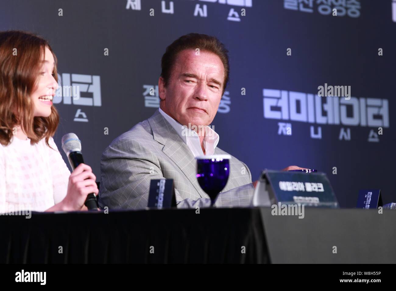 British actress Emilia Clarke, left, speaks next to American actor