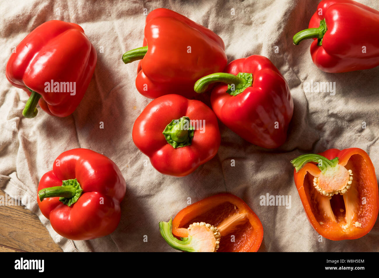 Raw Red Organic Bell Peppers Ready to Cook Stock Photo Alamy
