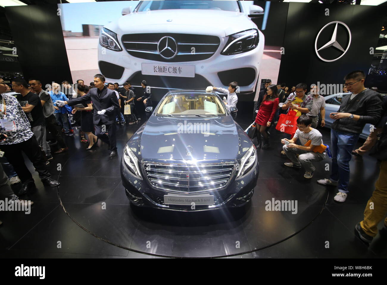 --FILE--Visitors look at a Mercedes-Maybach S 600 on display during the 12th China (Guangzhou) International Automobile Exhibition, known as Auto Guan Stock Photo