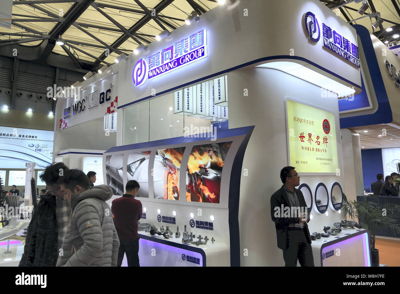 FILEPeople visit the stand of Wanxiang Group during the 2014 Automechanika Shanghai (AMS