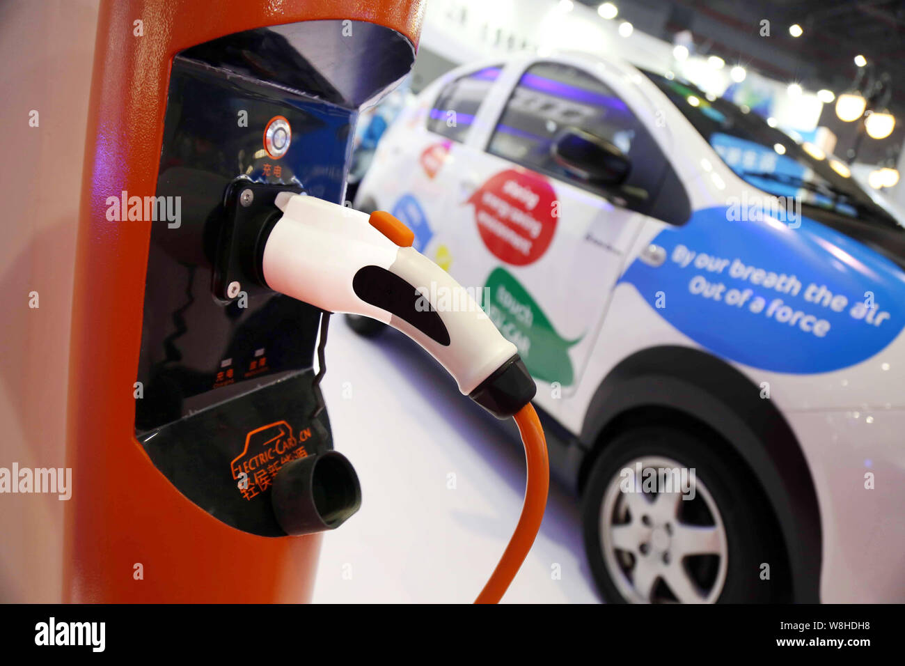 An electric car is on display during the 17th China International Industry Fair in Shanghai, China, 3 November 2015.  China will soon approve producti Stock Photo