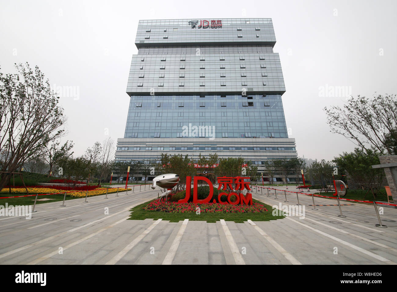 FILE--View of the headquarters building of online shopping site JD.com in  Beijing, China, 4 September 2015. Chinese e-commerce company JD.com Inc  Stock Photo - Alamy