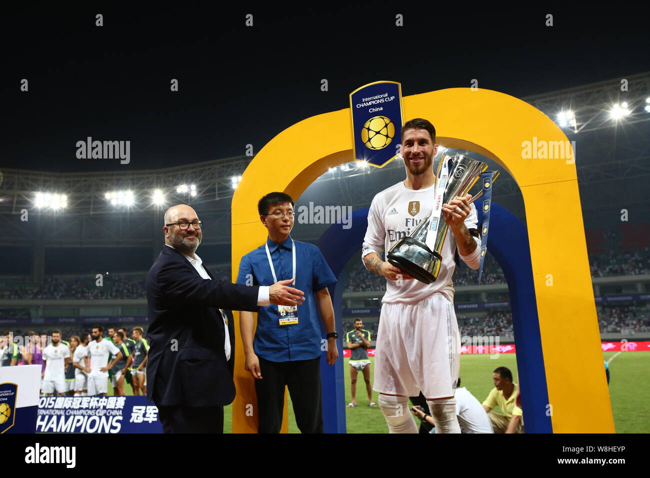 Sergio Ramos of Real Madrid, right, holds the winner's trophy for the China games of the International Champions Cup 2015 after Real Madrid defeated A Stock Photo