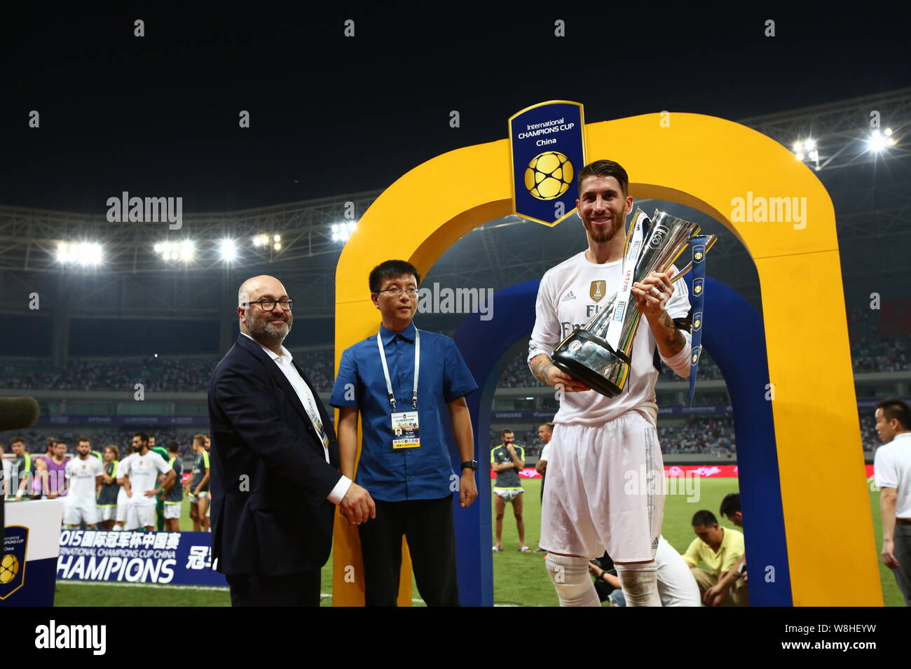 Sergio Ramos of Real Madrid, right, holds the winner's trophy for the China games of the International Champions Cup 2015 after Real Madrid defeated A Stock Photo