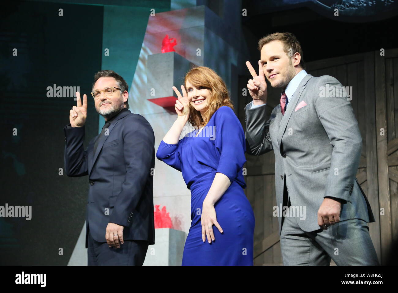 (From left) American director Colin Trevorrow, actress Judy Greer and actor Chris Pratt pose during a press conference for their movie 'Jurassic World Stock Photo