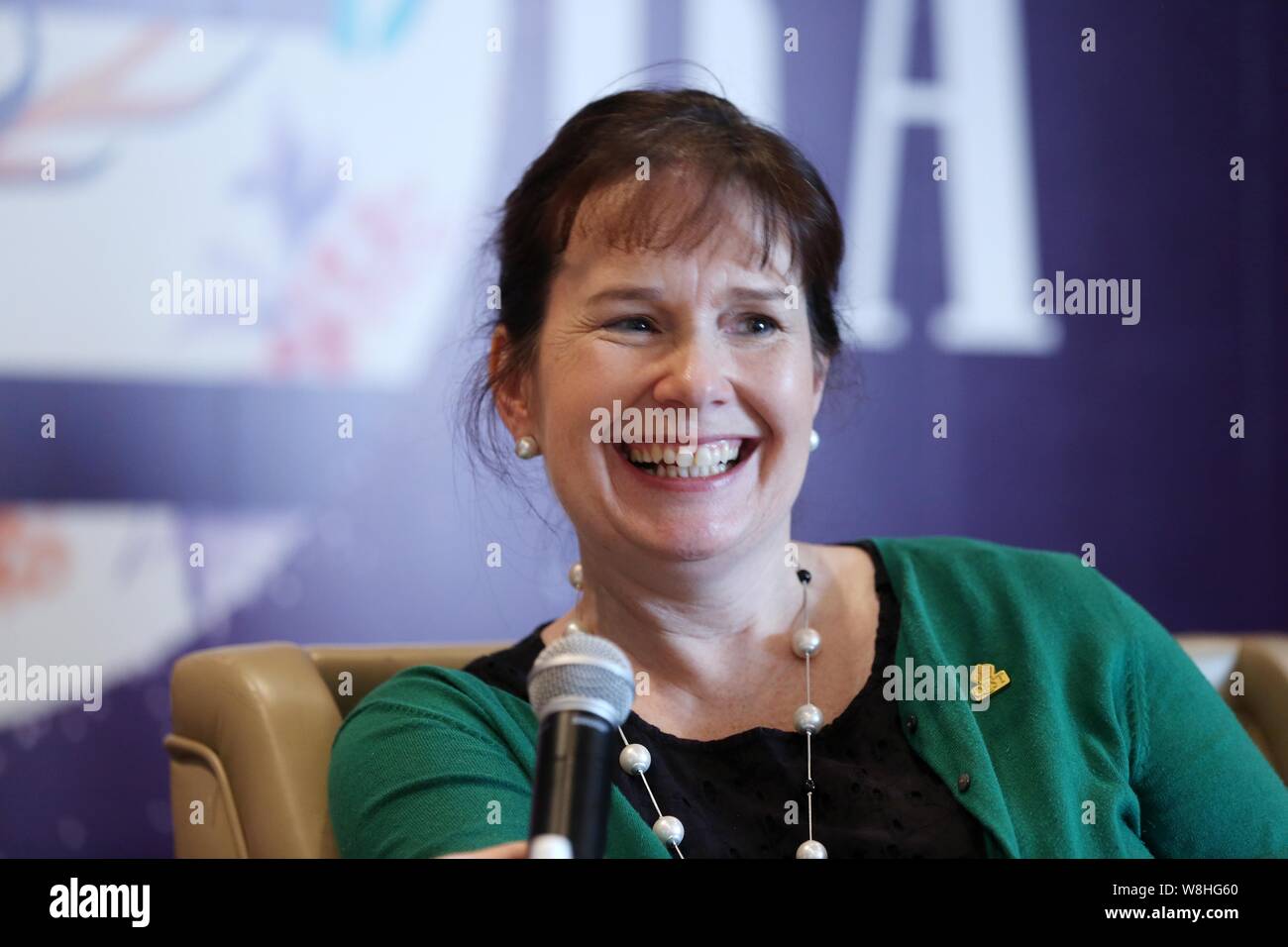 Julie Deane, founder of Cambridge Satchel Company, smiles during the Global Conference on Women and Entrepreneurship held by Alibaba Group in Hangzhou Stock Photo