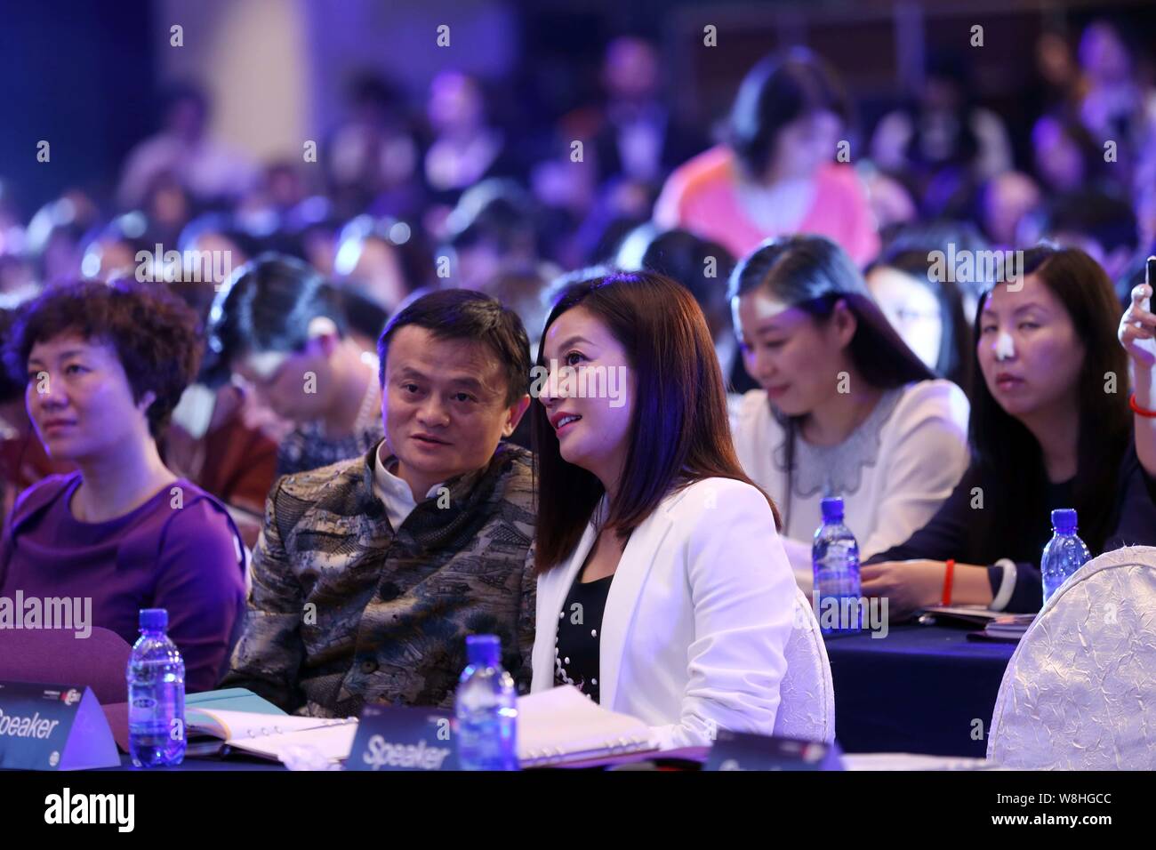 Chinese actress Zhao Wei, right, talks with Jack Ma Yun, center, chairman of Chinese e-commerce giant Alibaba Group, during the Global Conference on W Stock Photo