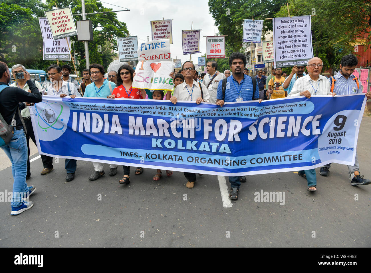 Indian students and scientists hold a banner and placards during the India March for Science in Kolkata.Scientists, scholars and students participate in 'India March for Science' to uphold their various demands like 3% and 10% of GDP allocation for science and education, and raising voice against policymakers pursuing policies that ignore scientific evidence. Stock Photo