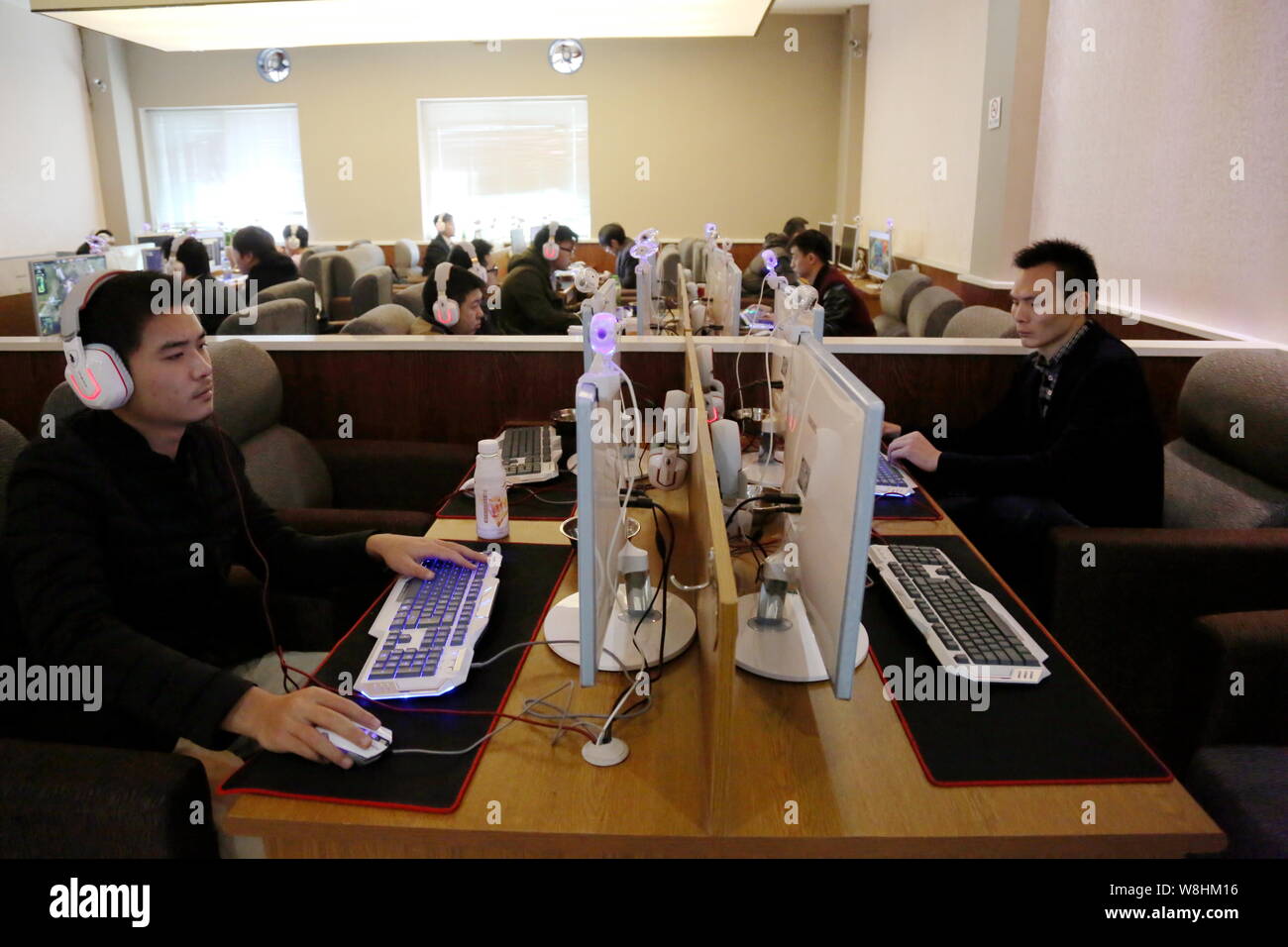 --FILE--Chinese netizens play online games at an Internet cafe in Shanghai, China, 8 December 2014.   Chinese leaders have made the passage of a cyber Stock Photo