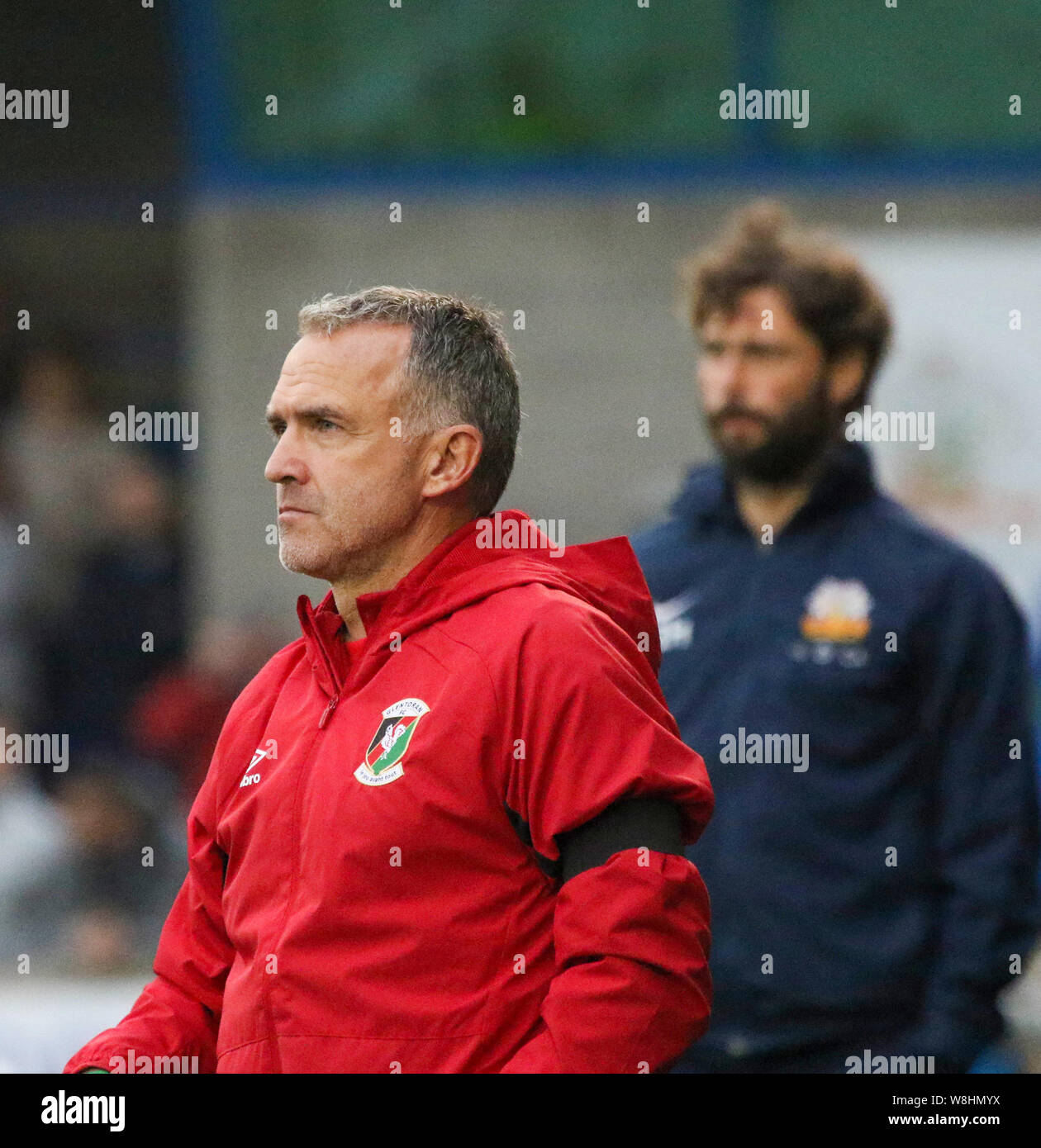 Mourneview Park, Lurgan, Northern Ireland, UK. 09th Aug 2019. Danske Bank Premiership; Glenavon v Glentoran (white) in the opening game of the 2019-2020 season in Northern Ireland. Opposing managers -Mick McDermott Glentoran (front) and Glenavon's Gary Hamilton (back). Credit:CAZIMB/Alamy Live News. Stock Photo