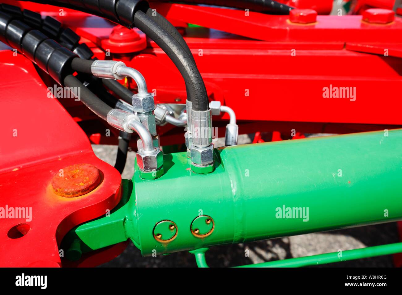 Closeup of tractor hydraulics to be coupled to farming machines Stock
