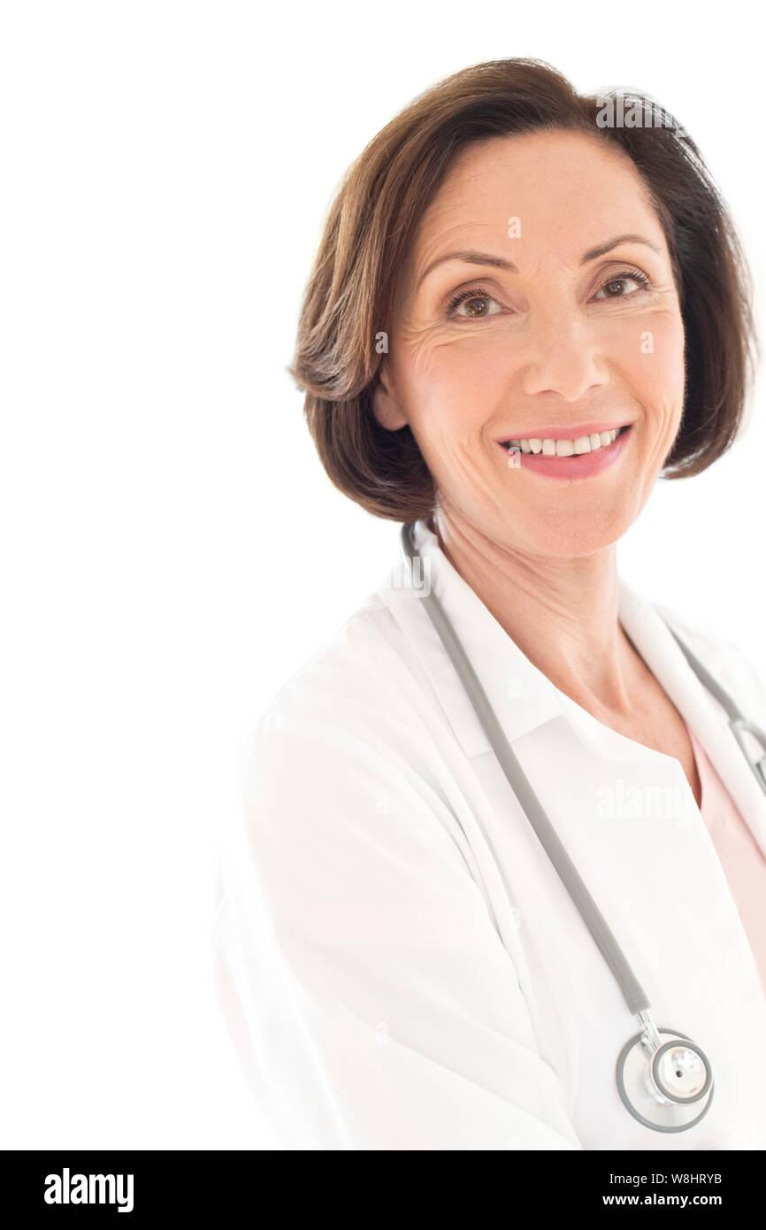 Senior female doctor smiling towards camera. Stock Photo