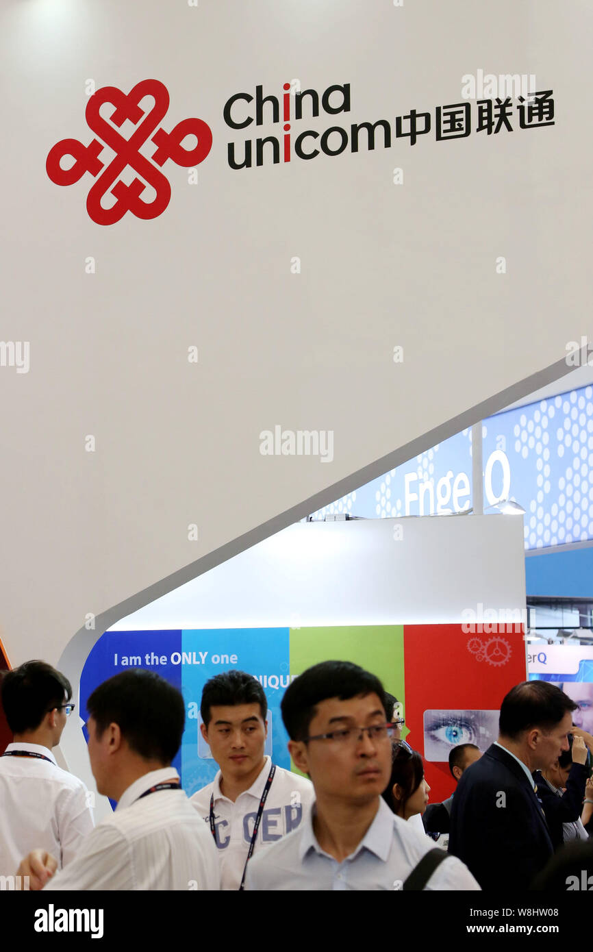 --FILE--People visit the stand of China Unicom during the GSMA Mobile World Congress 2015 in Shanghai, China, 15 July 2015.   Chinese mobile communica Stock Photo