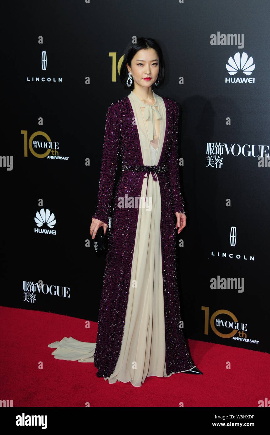 Chinese model Du Juan poses on the red carpet of the 10th anniversary ...