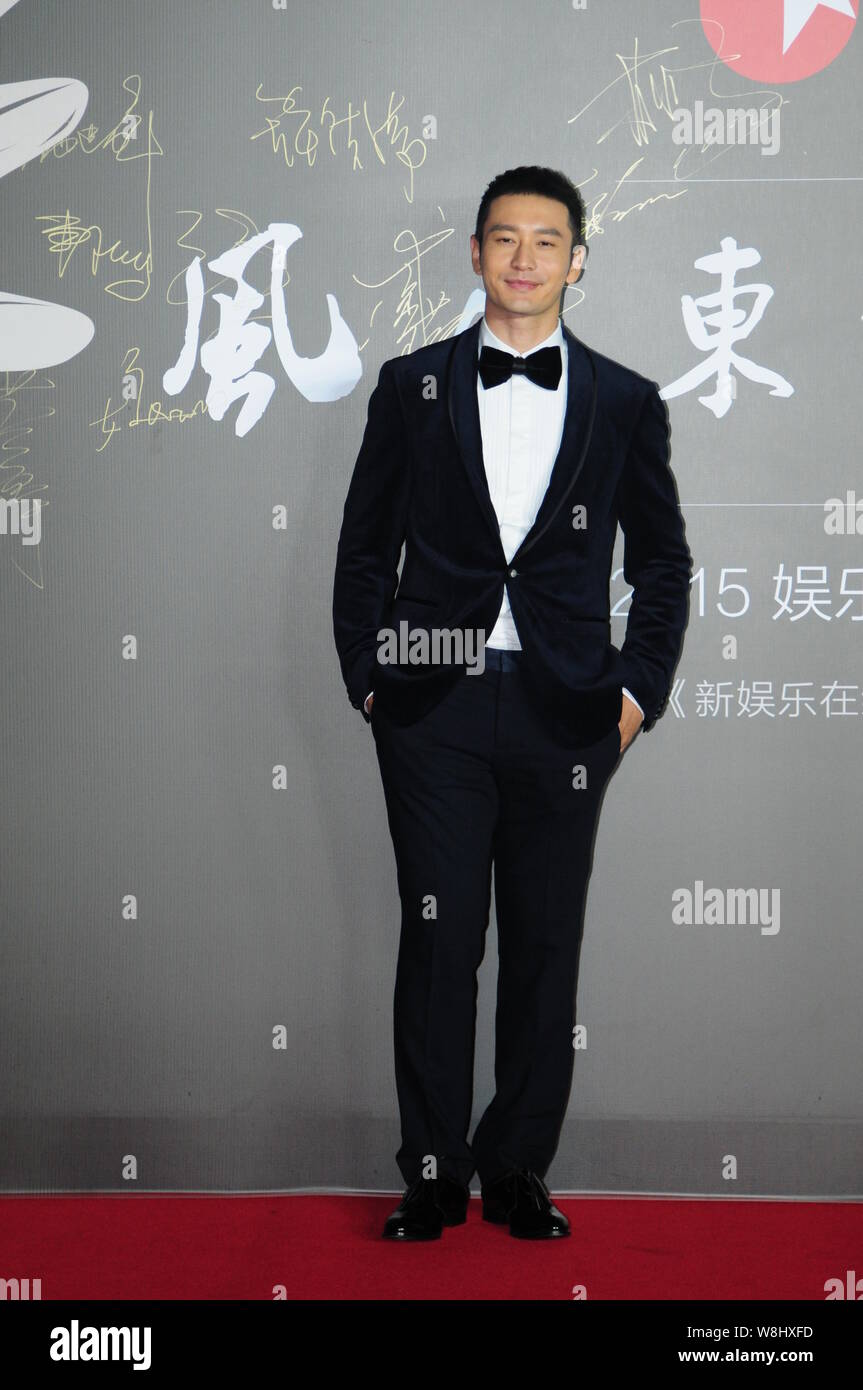 Chinese actor Huang Xiaoming poses on the red carpet for a gala of the Dragon TV in Shanghai, China, 14 November 2015. Stock Photo