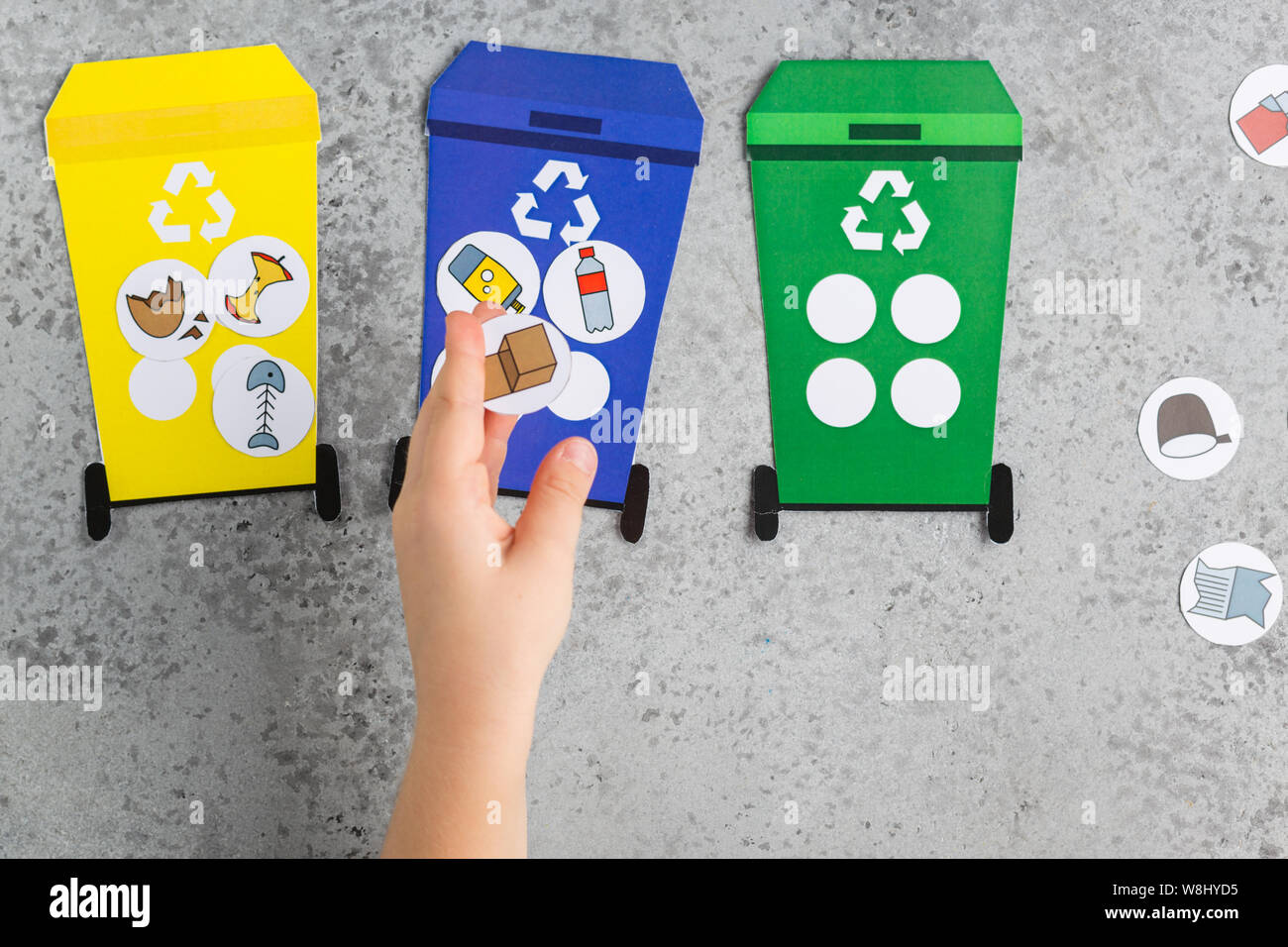 Recycling game design for children girl hands ecology education waste recycling concept save