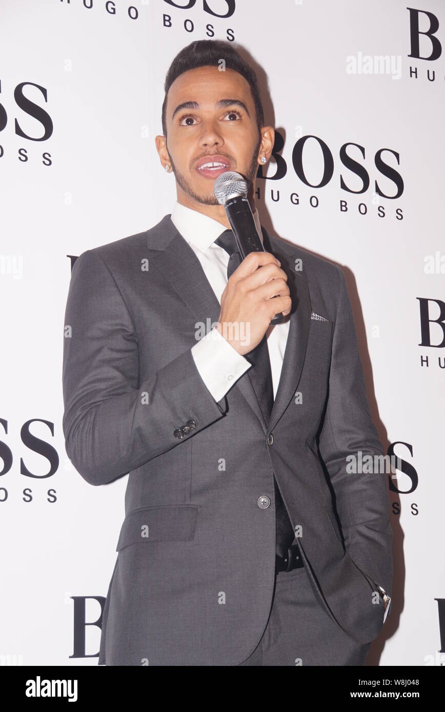 tie Worthless Grab British F1 driver Lewis Hamilton of Mercedes AMG speaks at a promotional  event for Hugo Boss in Shanghai, China, 8 April 2015 Stock Photo - Alamy