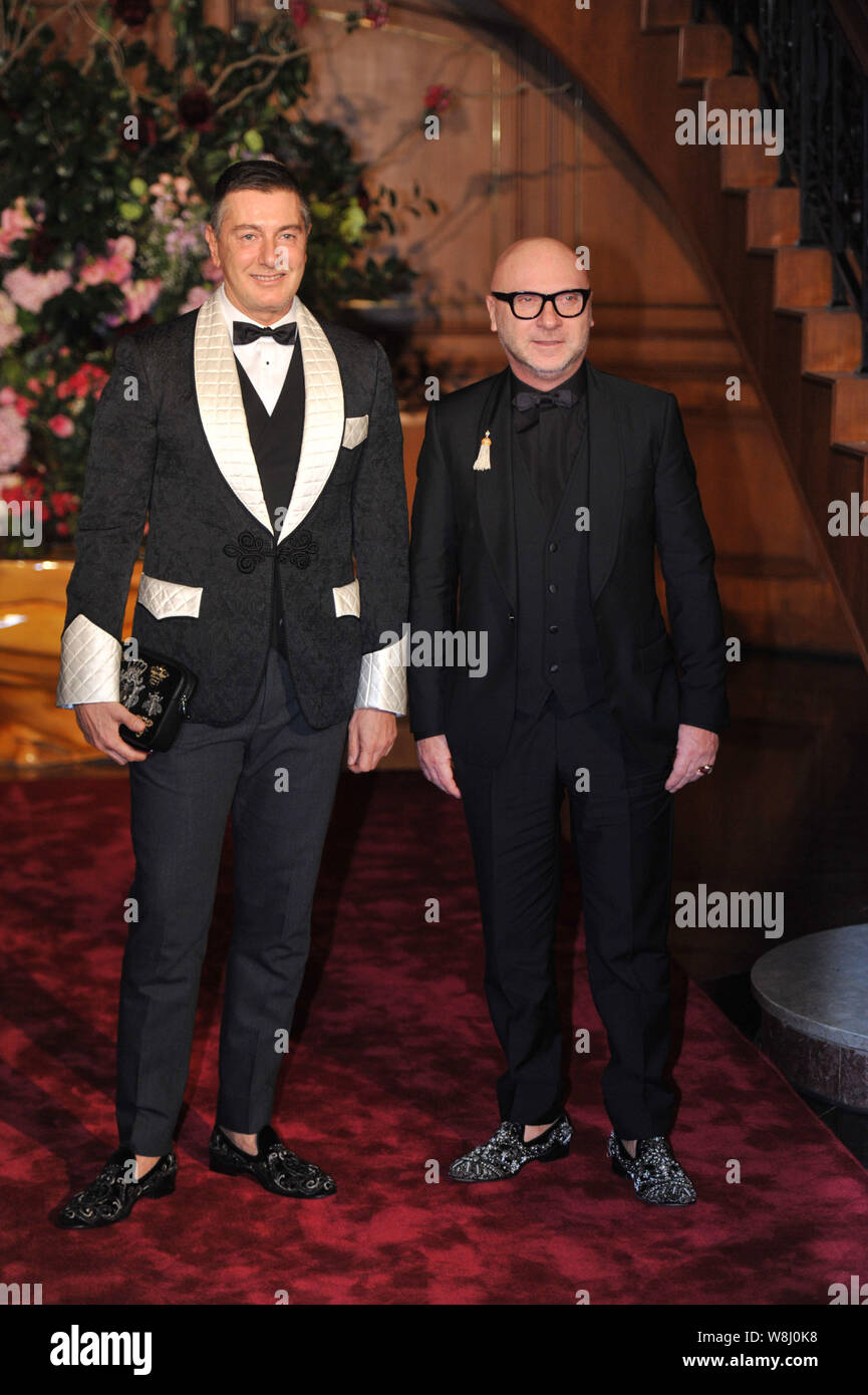 Italian fashion designers Stefano Gabbana, left, and Domenico Dolce pose at  a Dolce & Gabbana VIP dinner party in Beijing, China, 21 November 2015  Stock Photo - Alamy