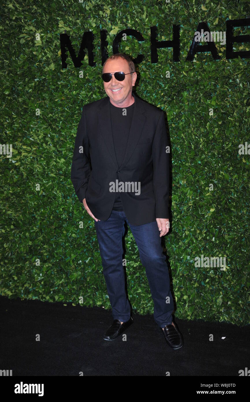 American fashion designer Michael Kors poses at the Michael Kors Young  China exhibition in Beijing, China, 18 November 2015 Stock Photo - Alamy