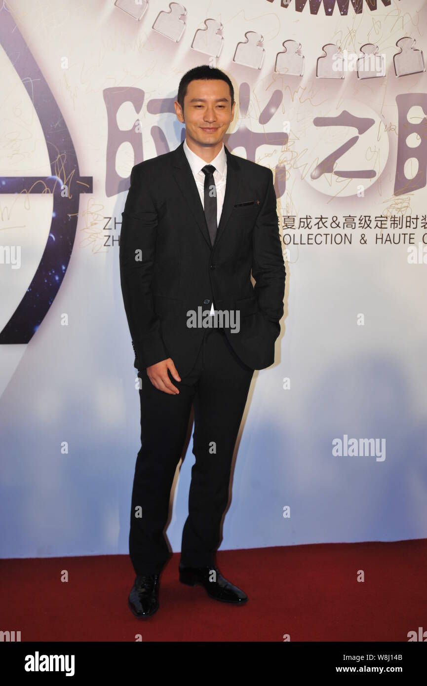 Chinese actor Huang Xiaoming poses as he arrives for the Zhang Shuai ...
