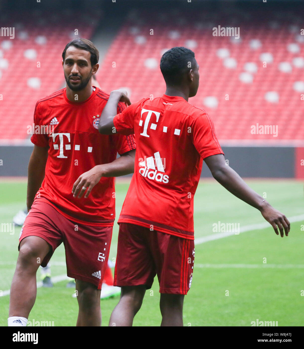 Medhi Benatia of Bayern Munich FC, left, takes part in a training session for the Audi Football Summer Tour China 2015 in Beijing, China, 17 July 2015 Stock Photo