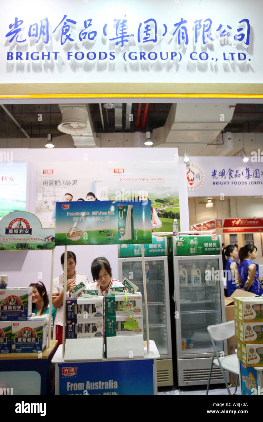 FILEChinese employees are seen at the stand of Bright Foods (Group