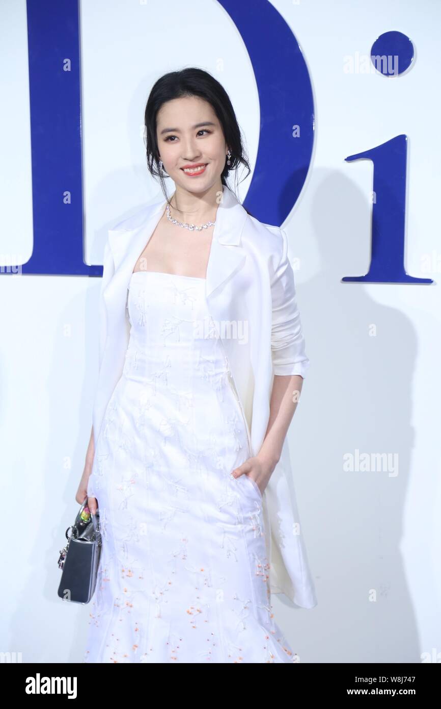 Chinese actress Liu Yifei poses as she arrives for the Dior