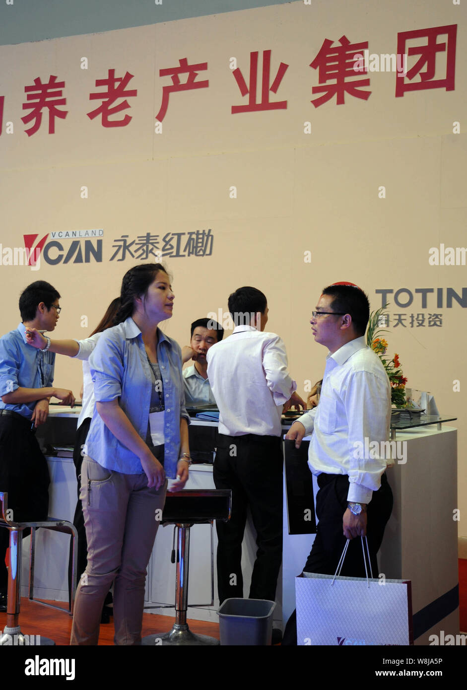 --FILE--View of the stand of Vcanland during a fair in Shanghai, China, 18 May 2012.    Vcanland Holdings Group is spearheading a search for a nationa Stock Photo