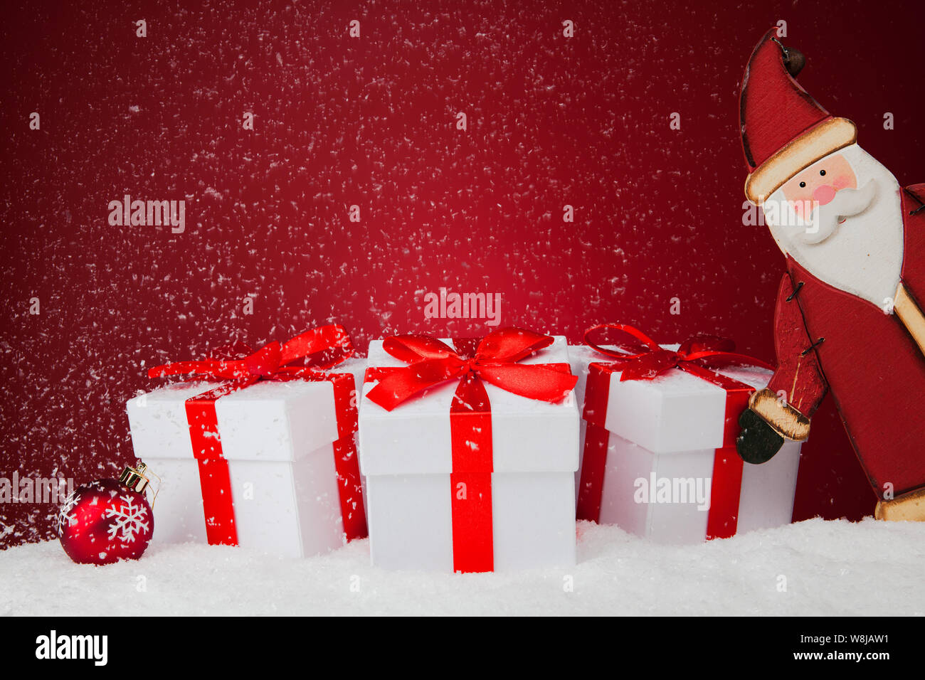 White gift boxes on red background with Santa Claus. Copy spase Stock ...