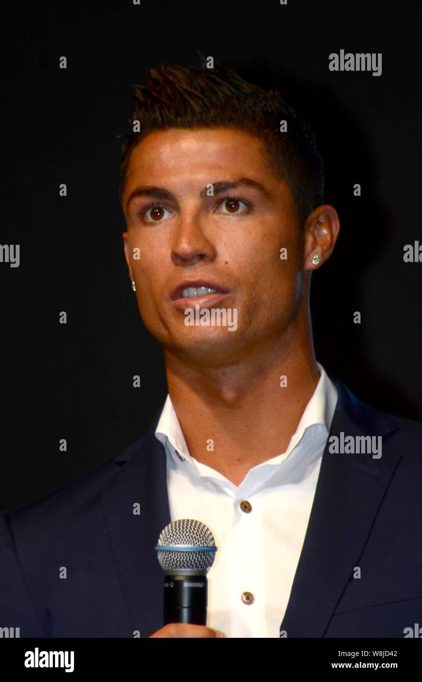 Portuguese football superstar Cristiano Ronaldo poses during a promotional event for MTG Training Gear Sixpad fitness equipment in Shanghai, China, 9 Stock Photo