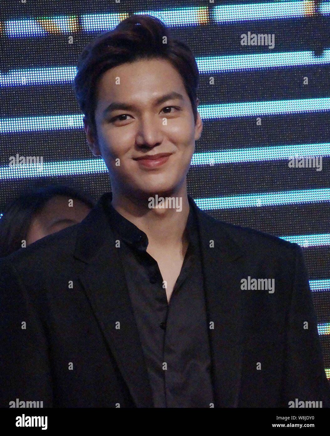 South Korean actor Lee Min-ho smiles at a press conference for his movie  