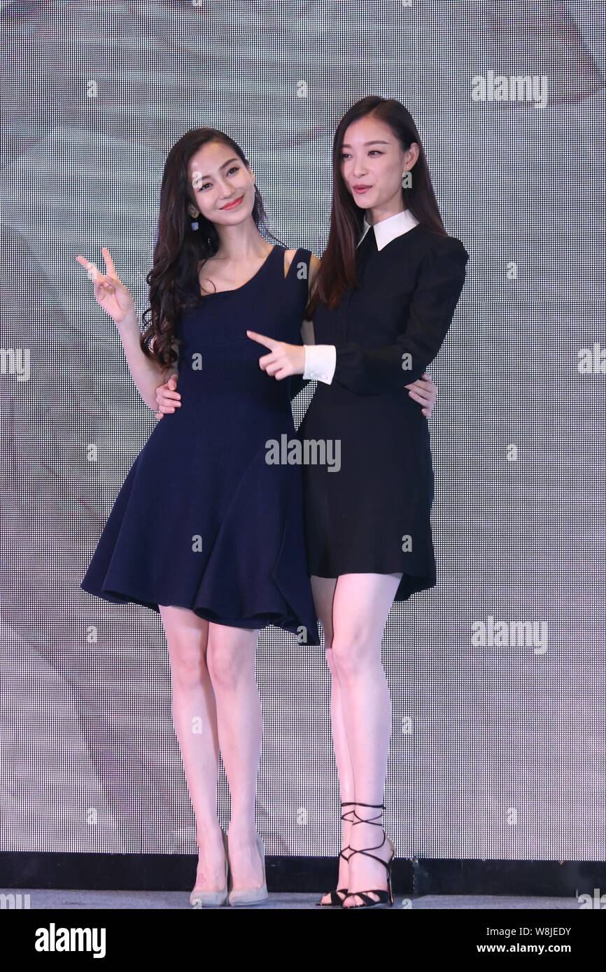 Hong Kong Model And Actress Angelababy Left And Chinese Actress Ni Ni Pose At A Press Conference To Promote Their New Movie Bride Wars In Shanghai Stock Photo Alamy
