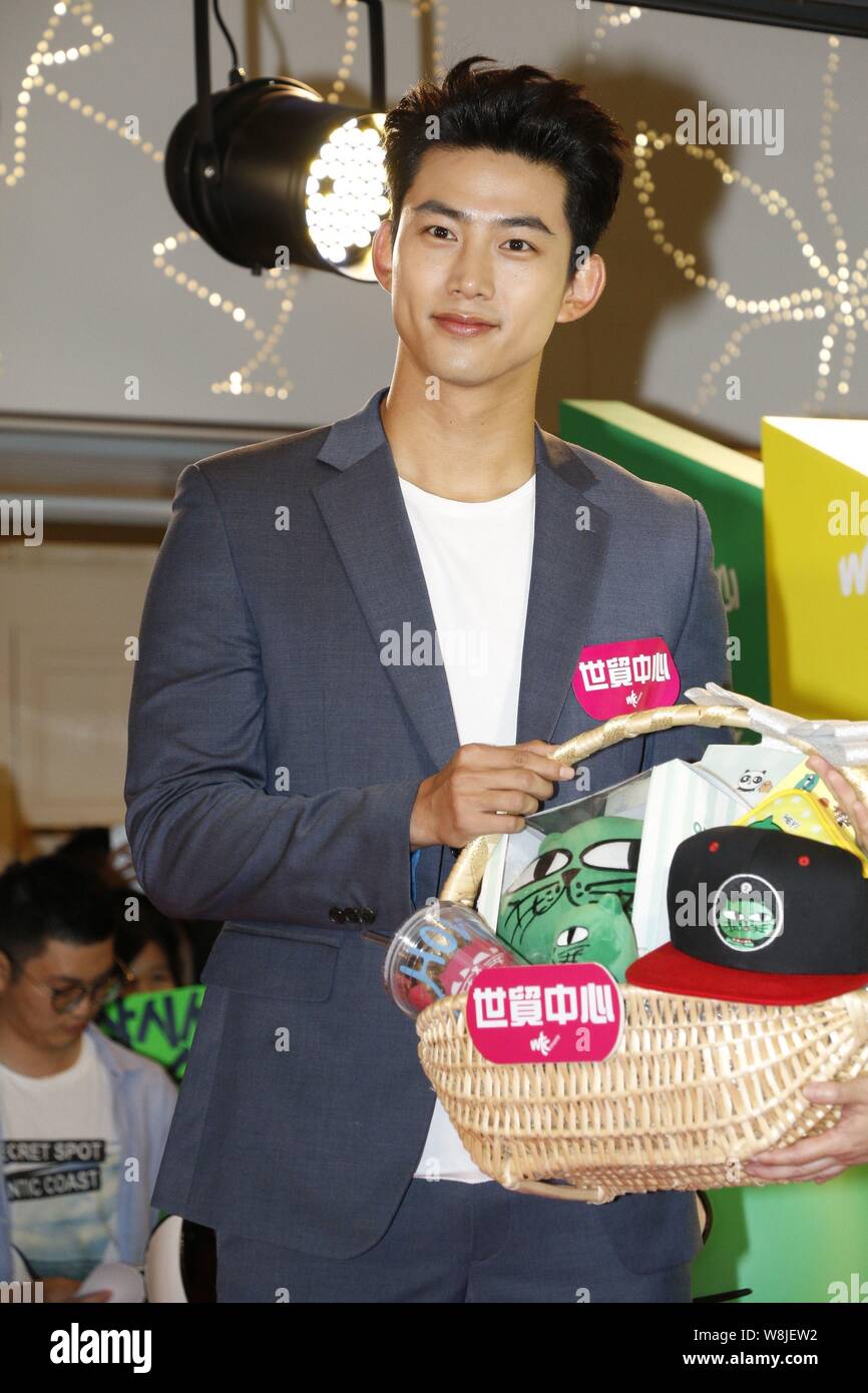 Singer and actor Ok Taec-yeon of South Korean boy group 2PM poses at a ...