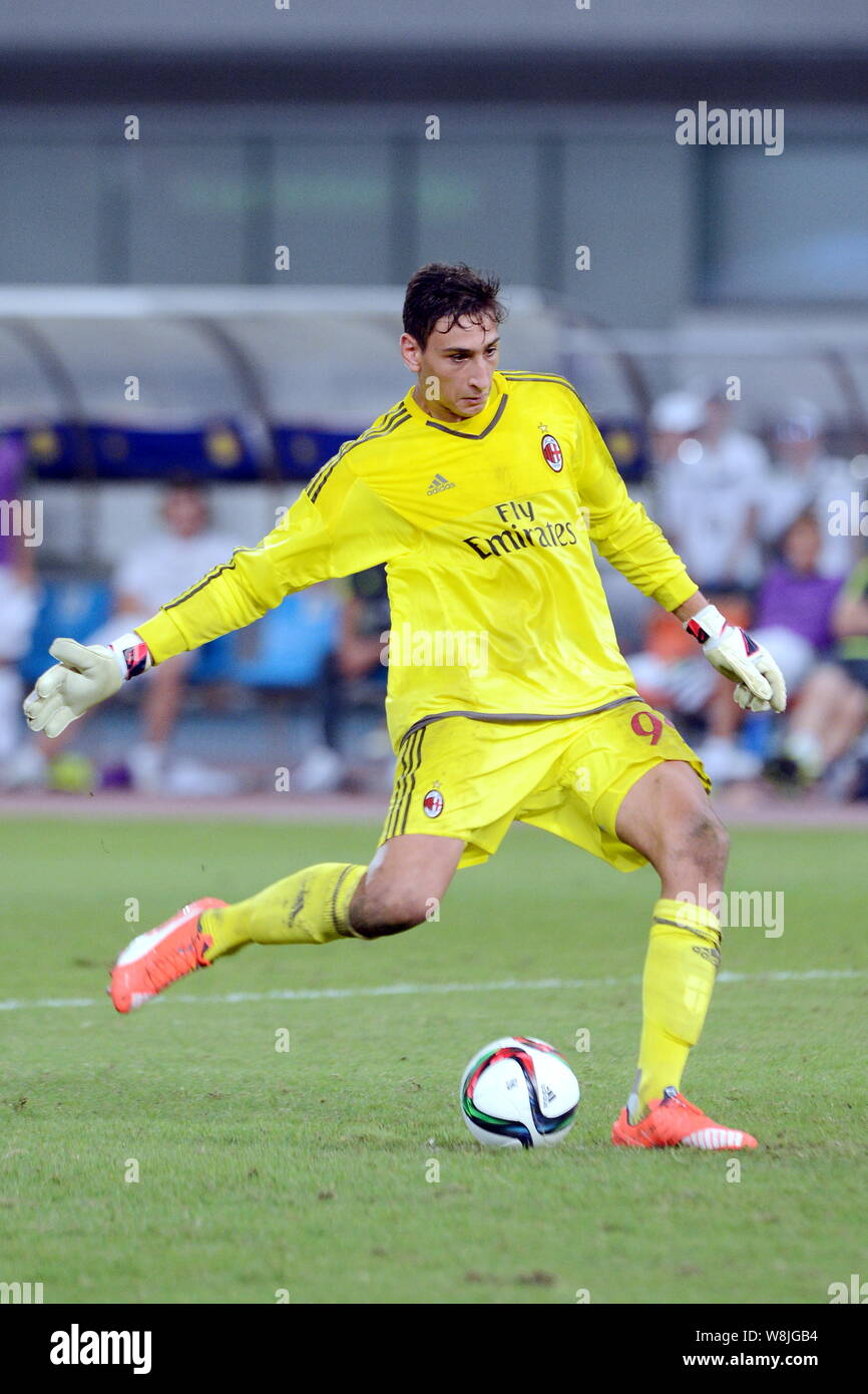 Goalkeeper Gianluigi Donnarumma of AC Milan plays a penalty shot ...