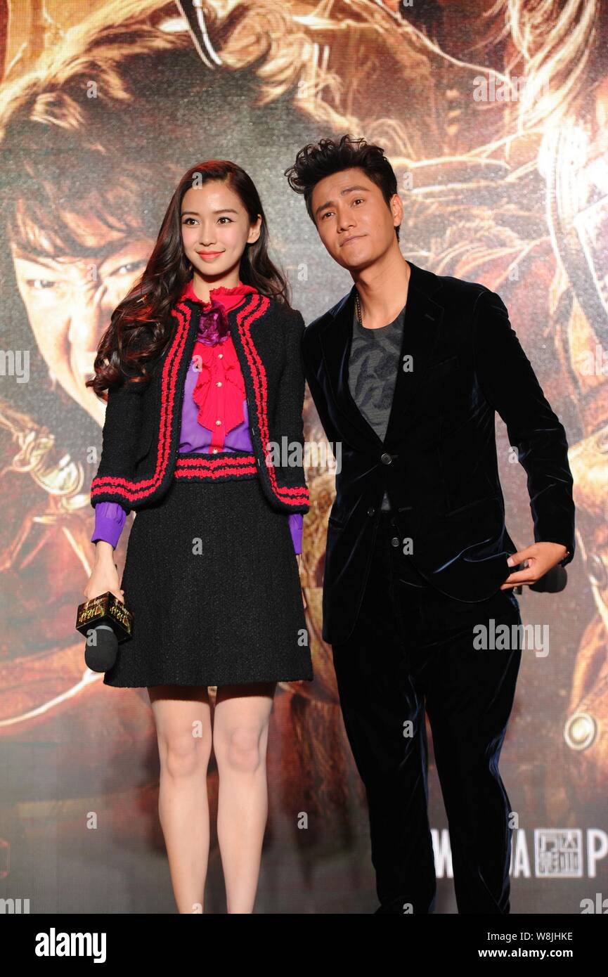 Hong Kong model and actress Angelababy, left, and Chinese actor Chen Kun  pose at a press conference for their new movie "Mojin-The Lost Legend" in  Bei Stock Photo - Alamy
