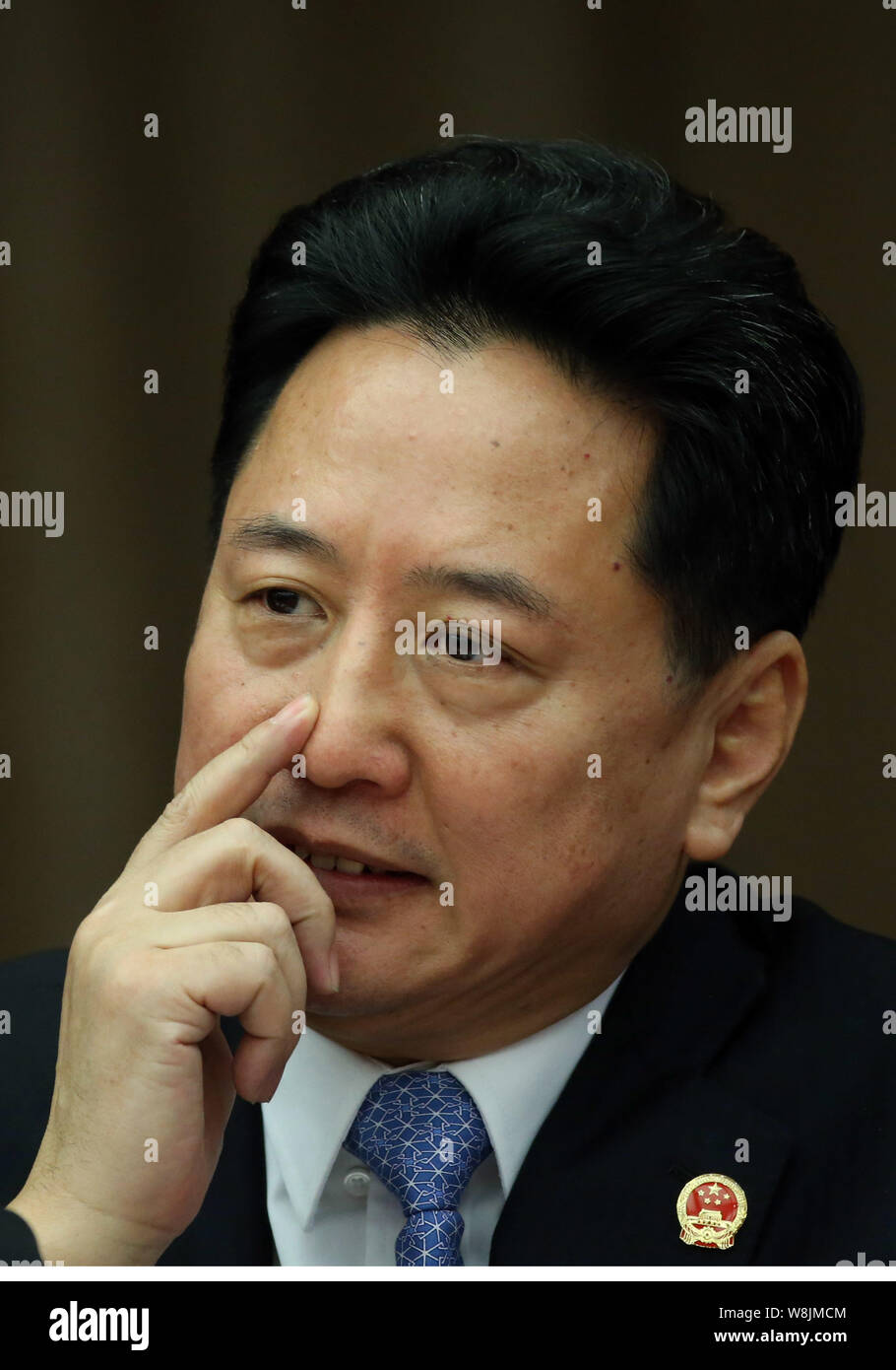 --FILE--Li Xiaopeng, governor of Shanxi province and the son of former Chinese premier Li Peng, attends a plenary discussion of the Second Session of Stock Photo