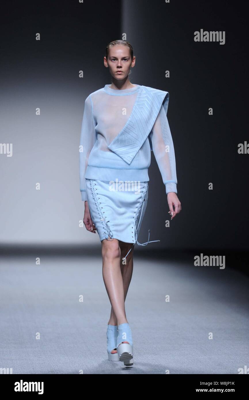 A model displays a new creation at the C.COLECTARE by SICONG LIU ...