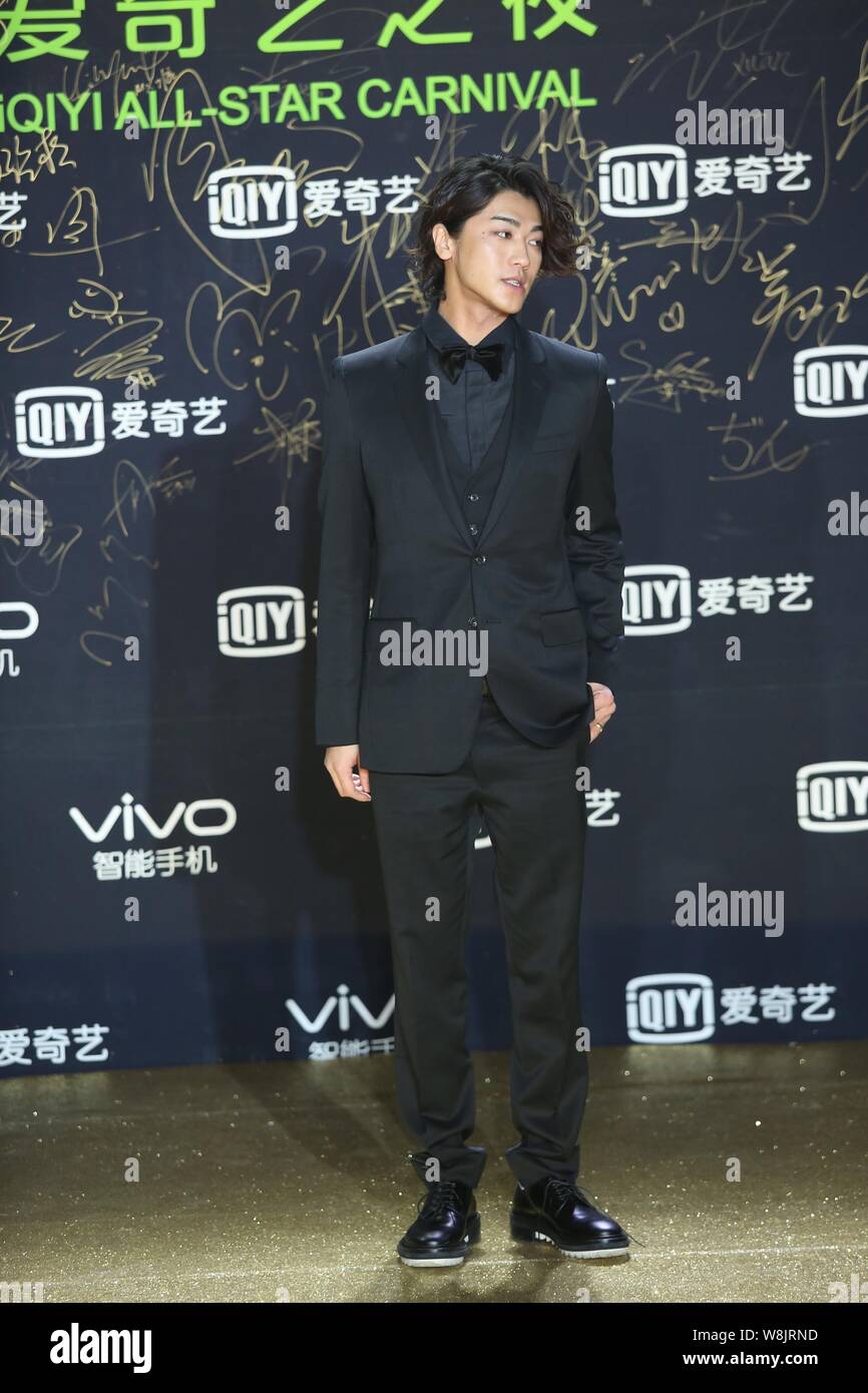 Japanese singer Jin Akanishi poses on the red carpet for the 2016
