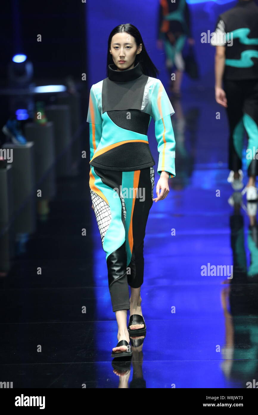 A model displays a new creation at the Qiaodan Cup 10th China Sports Wear  Design Contest & Agreement Renewal Ceremony during the China Fashion Week  Sp Stock Photo - Alamy