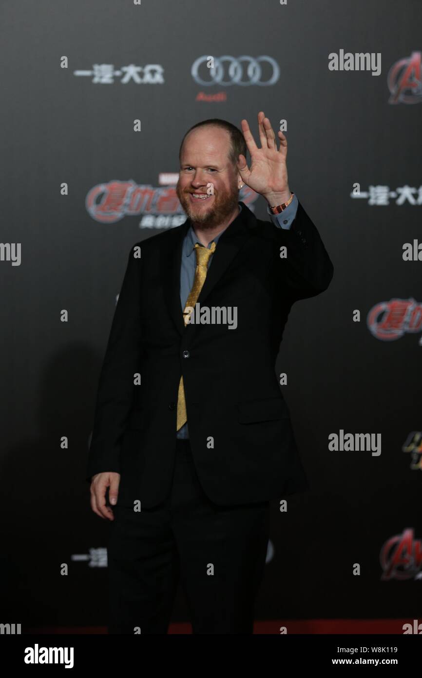 American director Joss Whedon waves during a press conference for his movie 'Avengers: Age of Ultron' in Beijing, China, 19 April 2015. Stock Photo