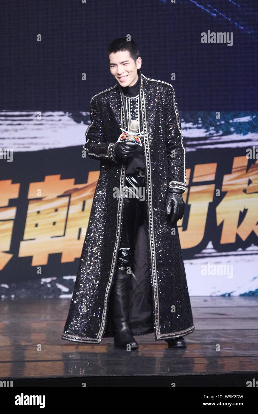 Taiwanese singer Jam Hsiao smiles at a promotional event for a mobile