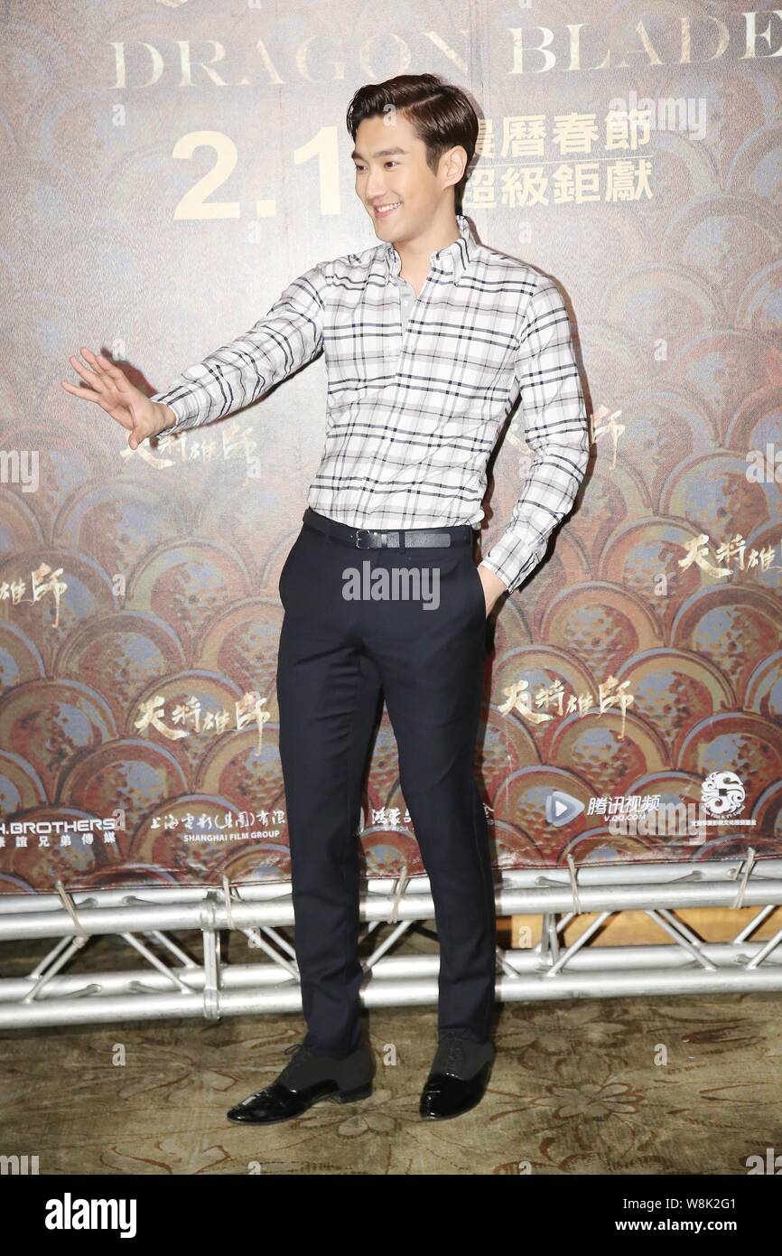 South Korean actor Choi Siwon waves at a press conference for his new movie 'Dragon Blade' in Taipei, Taiwan, 12 February 2015. Stock Photo