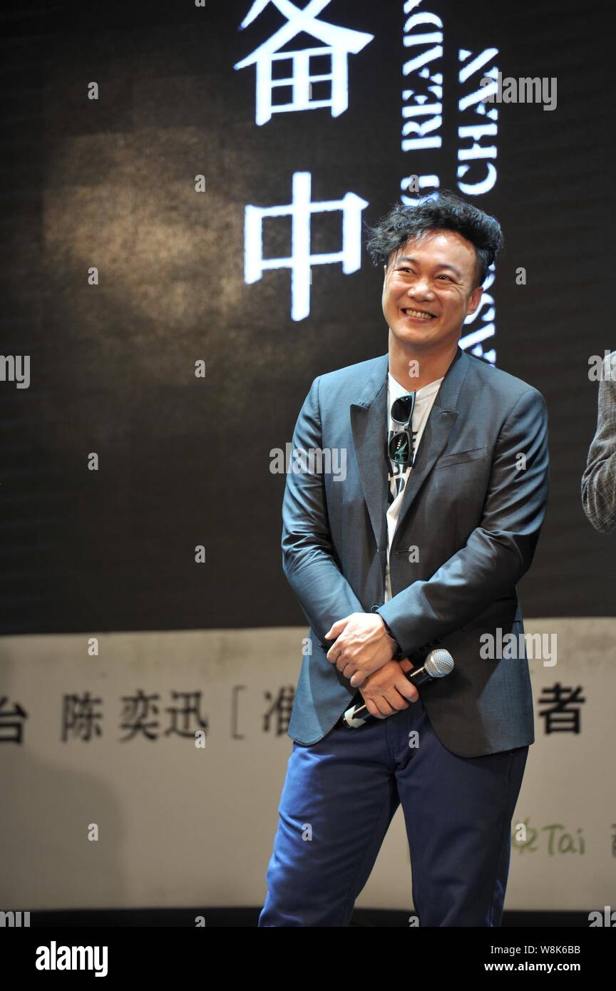 Hong Kong singer Eason Chan smiles at a press conference for his new ...